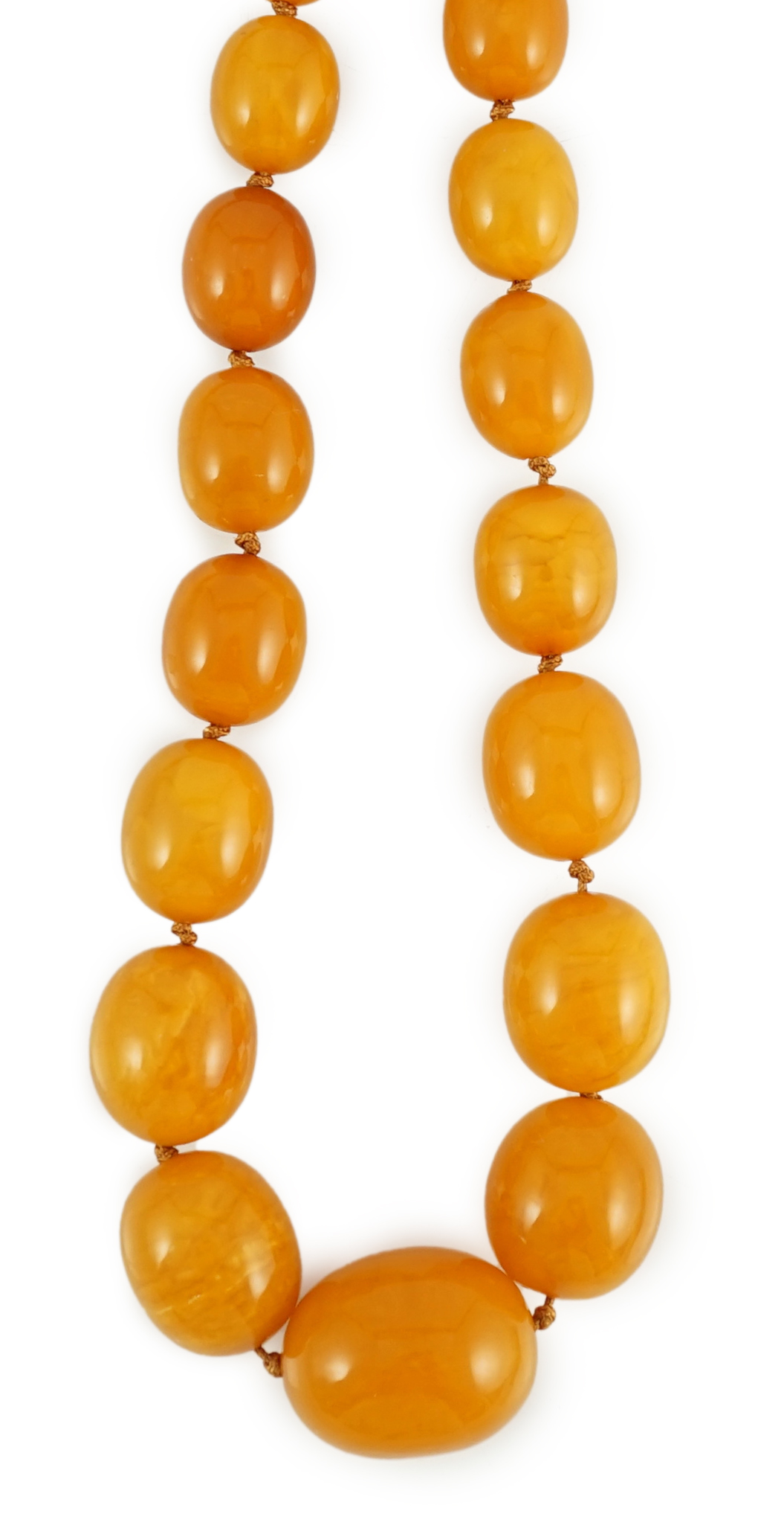 A single strand graduated oval amber bead necklace, 110cm, gross weight 163 grams